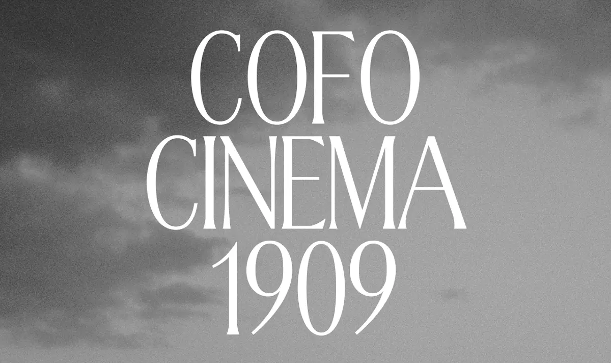 White text reading "COFO CINEMA 1909" overlaid on a stormy grey sky