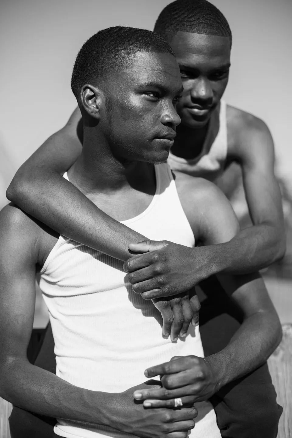 Dealing with Distance, London © Renee Osubu. "Nicholas and Michael are identical twins who share life’s highs and lows. They have experienced distance for the first time as one is attending university out of London while the other pursues a career in the capital. Meeting the brothers has opened my mind to the importance of companionship among men."
