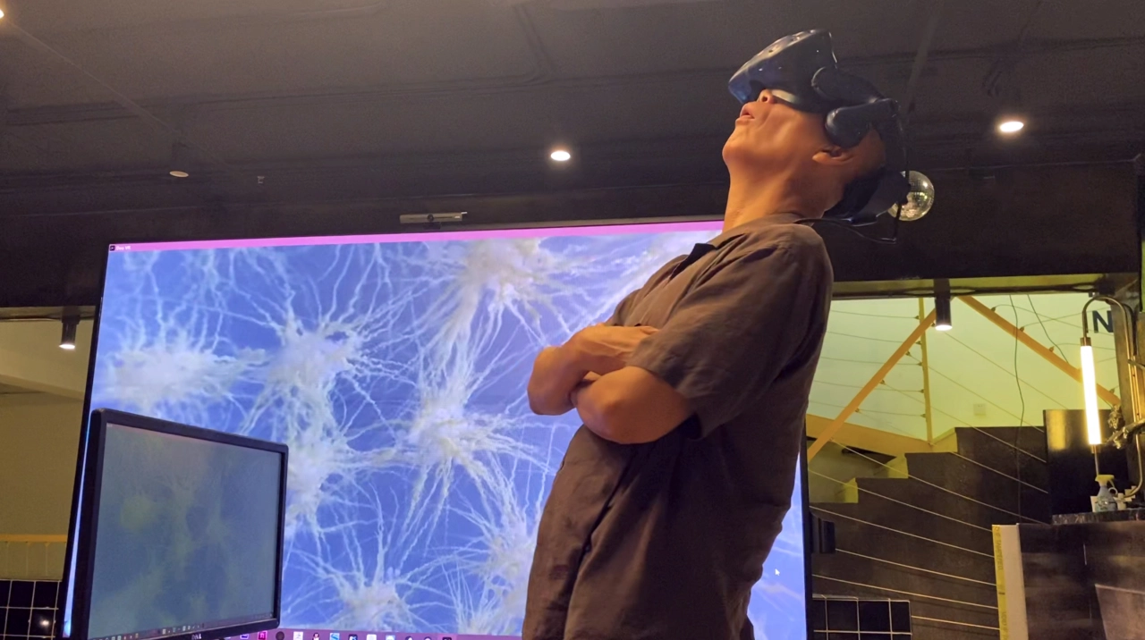 Cai Guo-Qiang reviewing a rough cut of his VR work Sleepwalking in the Forbidden City in 2020. Photo by 33 Studio, courtesy Cai Studio