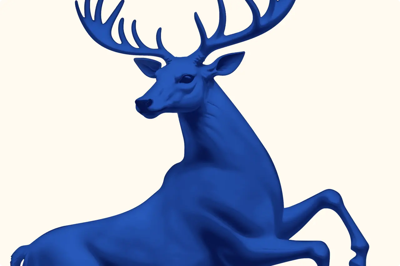 Bright blue sculptural stag with branching antlers in a leaping pose against a cream background