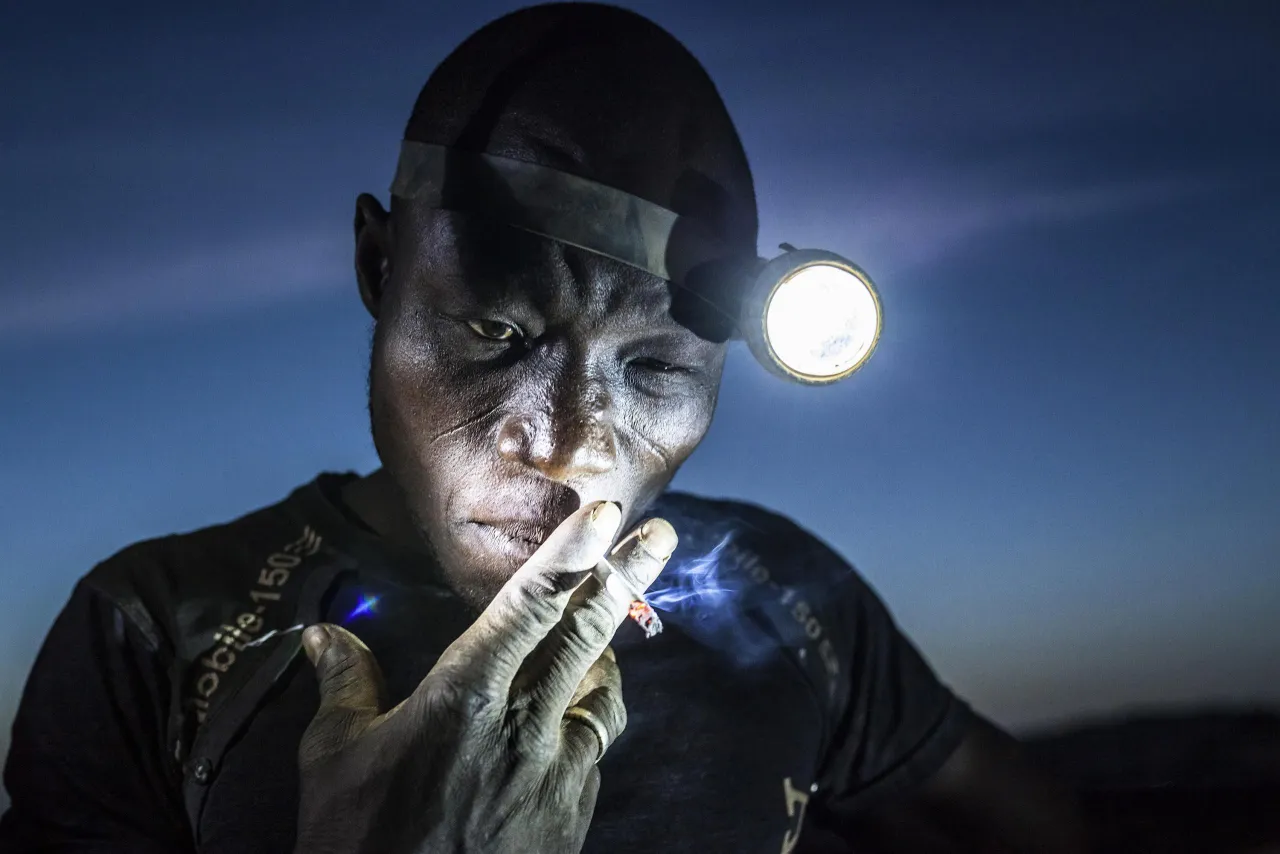 People, second prize singles: A mine worker takes a smoke break before going back into the pit. Miners in Bani face harsh conditions and exposure to toxic chemicals and heavy metals. Matjaz Krivic.
