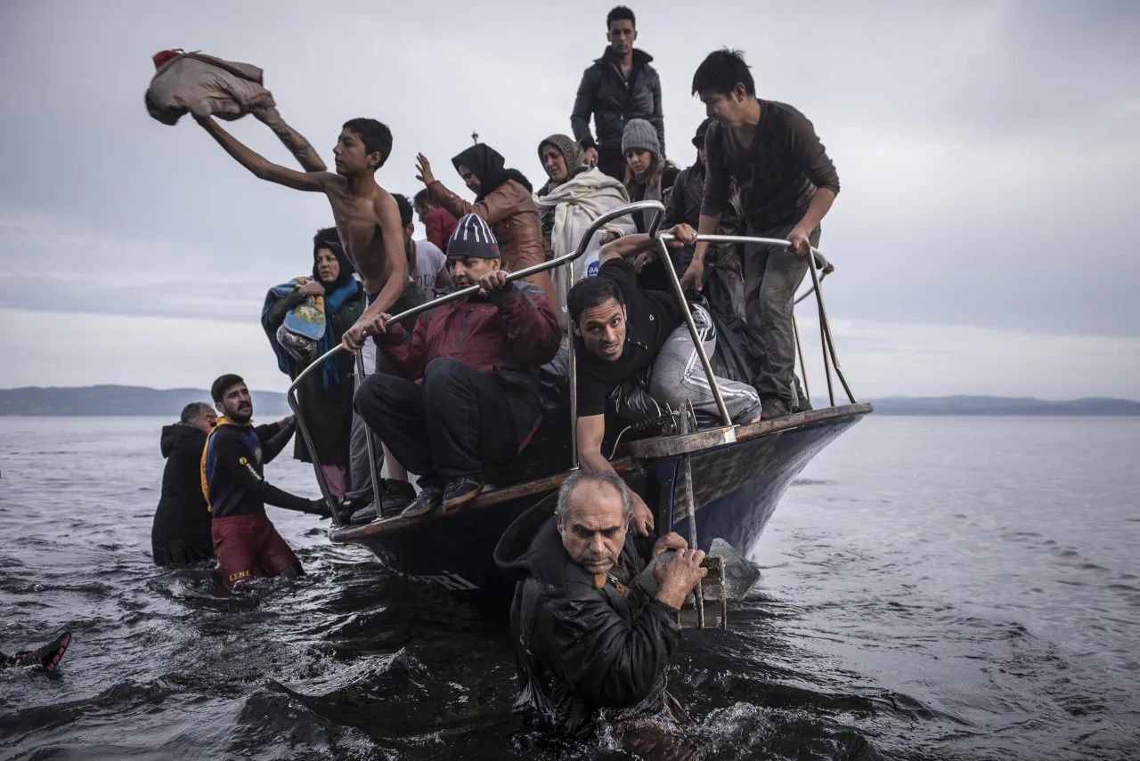 General News, first prize stories: Refugees arrive by boat near the village of Skala on Lesbos, Greece. Sergey Ponomarev.