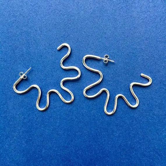 XXL Wiggle Hoops by [Alice Chandler](https://alicechandler.bigcartel.com/product/xxl-wiggle-hoops). Priced at £50