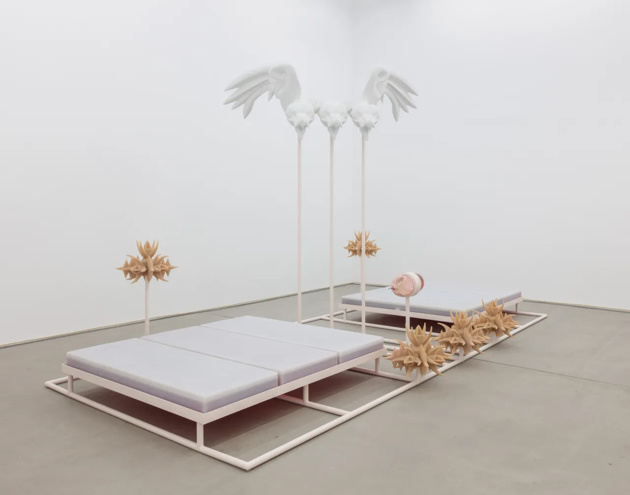 Marguerite Humeau HARRY II (BODY), 2017 Polystyrene, resin, fibreglass, white paint, acrylic parts, sprayed metal stand, water tanks, *raptors* – sourced on an anti-climbing security systems website – cast in artificial human skin, rubber, glass artificial Blood-sucking organ, artificial human blood, sound Stan Narten, JSP Photography  Courtesy the artist and C L E A R I N G New York / Brussels