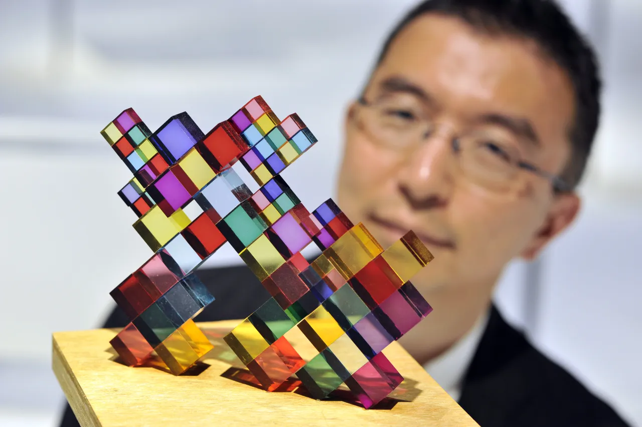 Sou Fujimoto, acclaimed Japanese architect, inspects Stacked Colours, one of 100 exhibits on display in his exhibition Futures of the Future at Japan House London