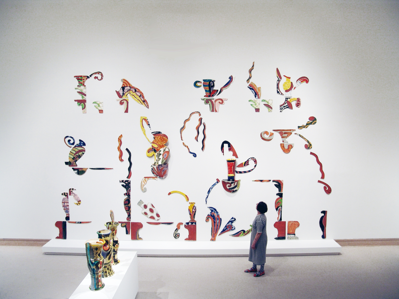 Betty Woodman,  House of the South, 1996 Glazed earthenware, epoxy resin, lacquer, paint 403.9 x 624.8 x 24.1 cm Installation view of The Art of Betty Woodman, The Metropolitan Museum of Art, New York, NY, April 25—July 30, 2006. Photographer: Eli Ping. Courtesy The Woodman Family Foundation. © Woodman Family Foundation / DACS, London.
