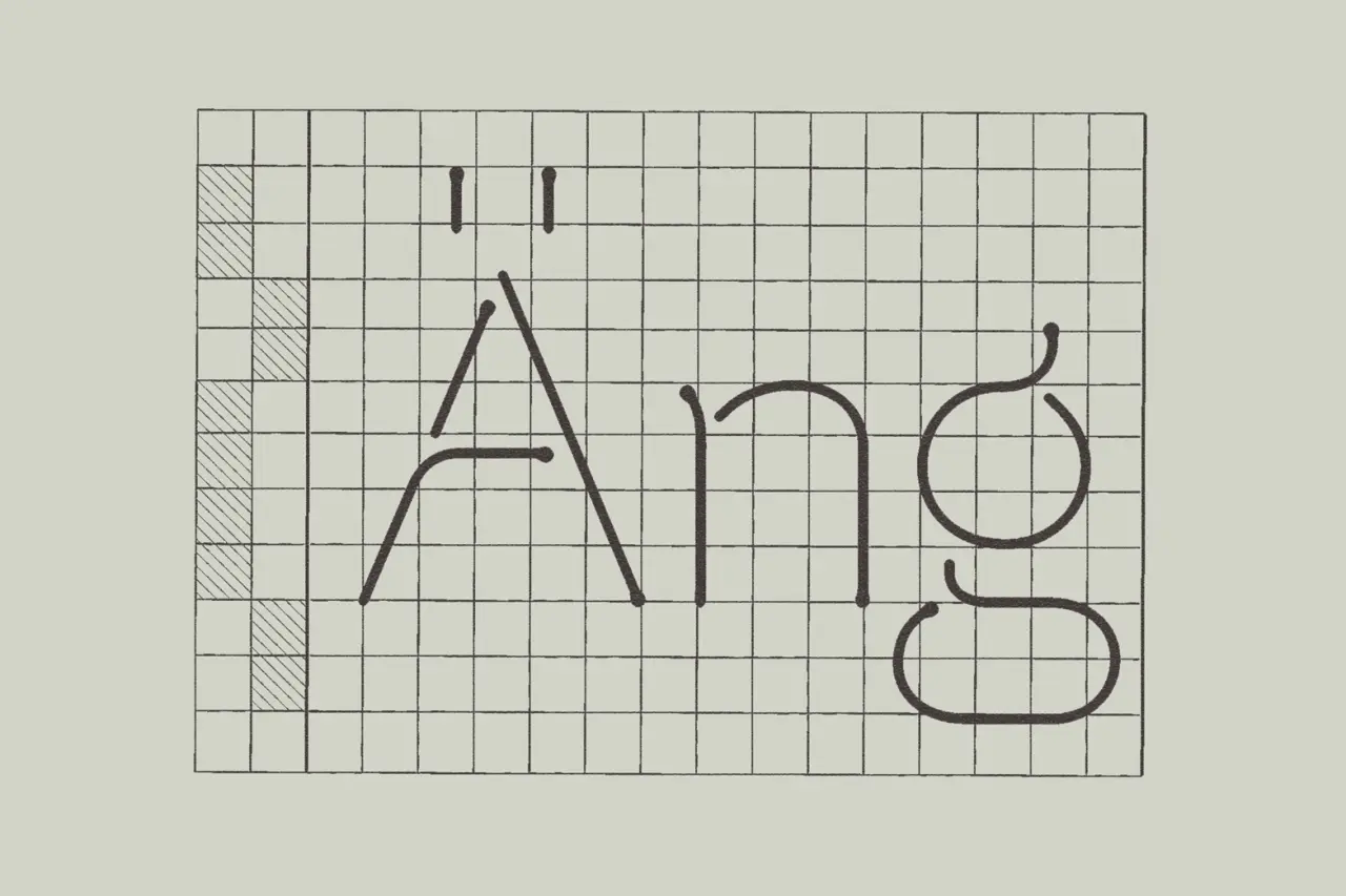 Word "Amigo" drawn on graph paper with black pen strokes following the gridlines