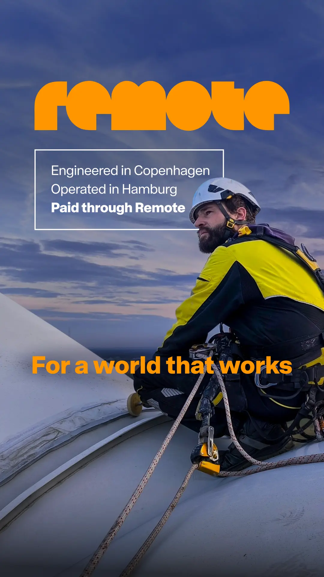 Worker in yellow and black safety gear secured by rope atop an industrial structure against a cloudy sky, with Remote's orange logo and tagline above