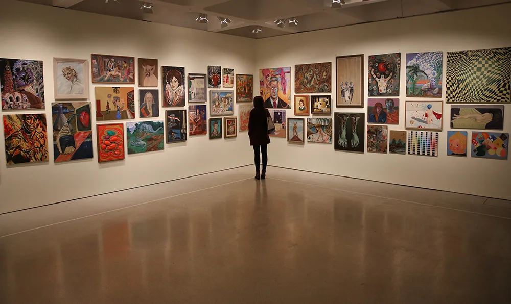 Magnificent Obsessions: The Artist as Collector, Jim Shaw’s thrift store paintings collection. Photograph by Peter McDiarmid
