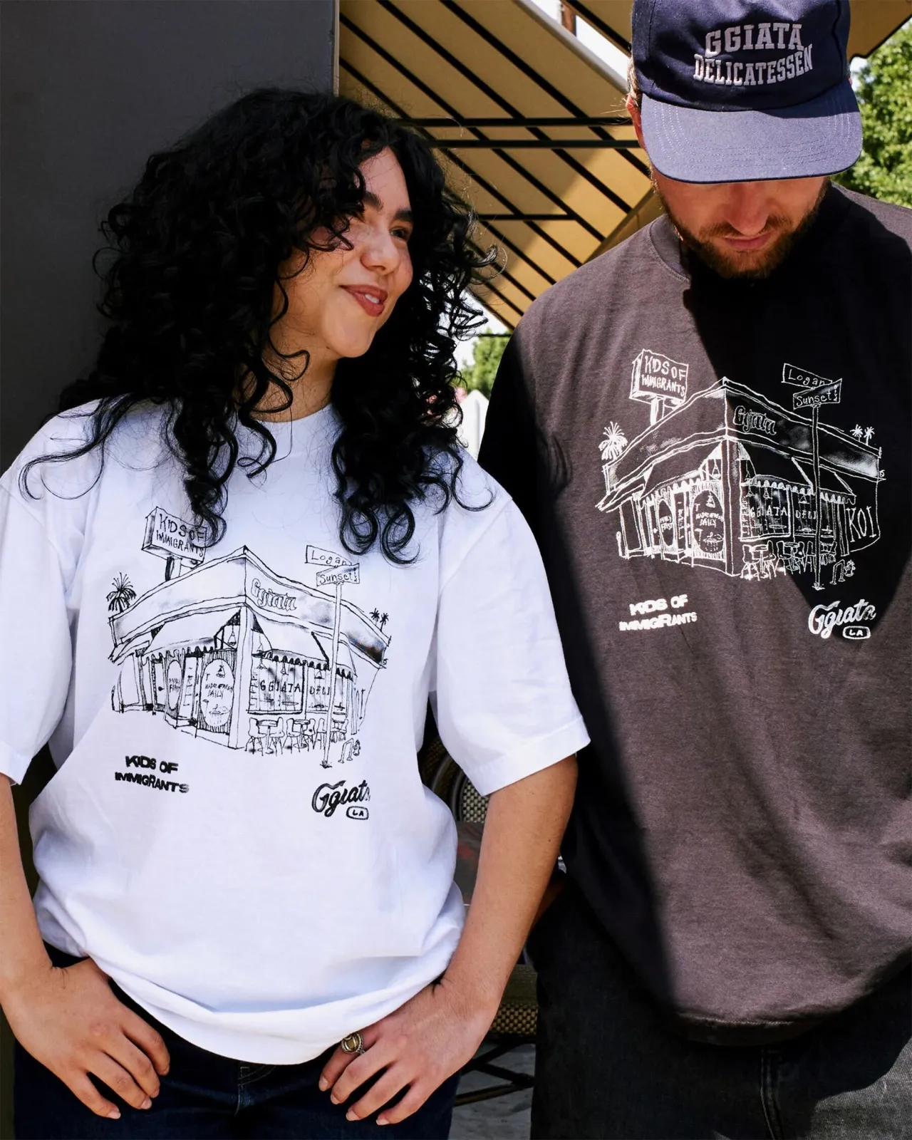 Sunset & Logan Tee, illustration by Nick Apple, photo by Nevyn Matthews. © Ggiata × Kids of Immigrants