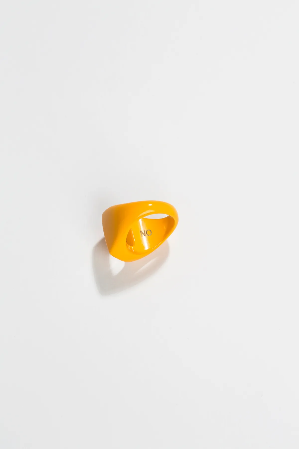 Tobias Rehberger - NO Edition 30; sterling silver, powder coated, orange (2) courtesy GEMS AND LADDERS, photo Nicolas Duc