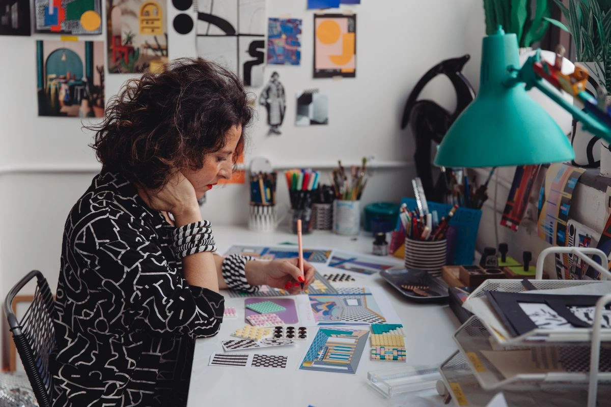 Camille Walala experimenting with colour, pattern and shapes in her studio for major collaboration with LEGO. Photo credit Dunja Opalko.