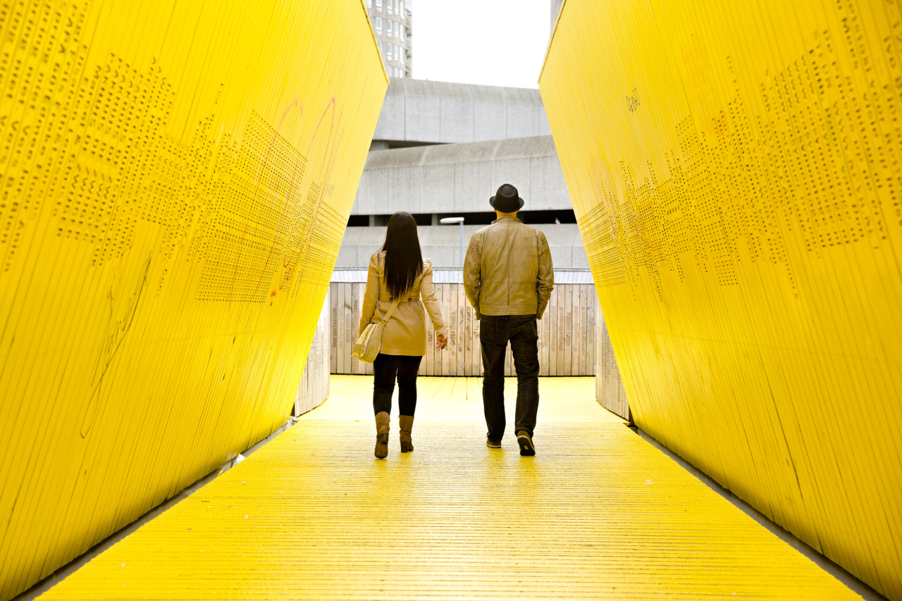 People walking across the Luchtsingel. Photography by Iris van den Broek