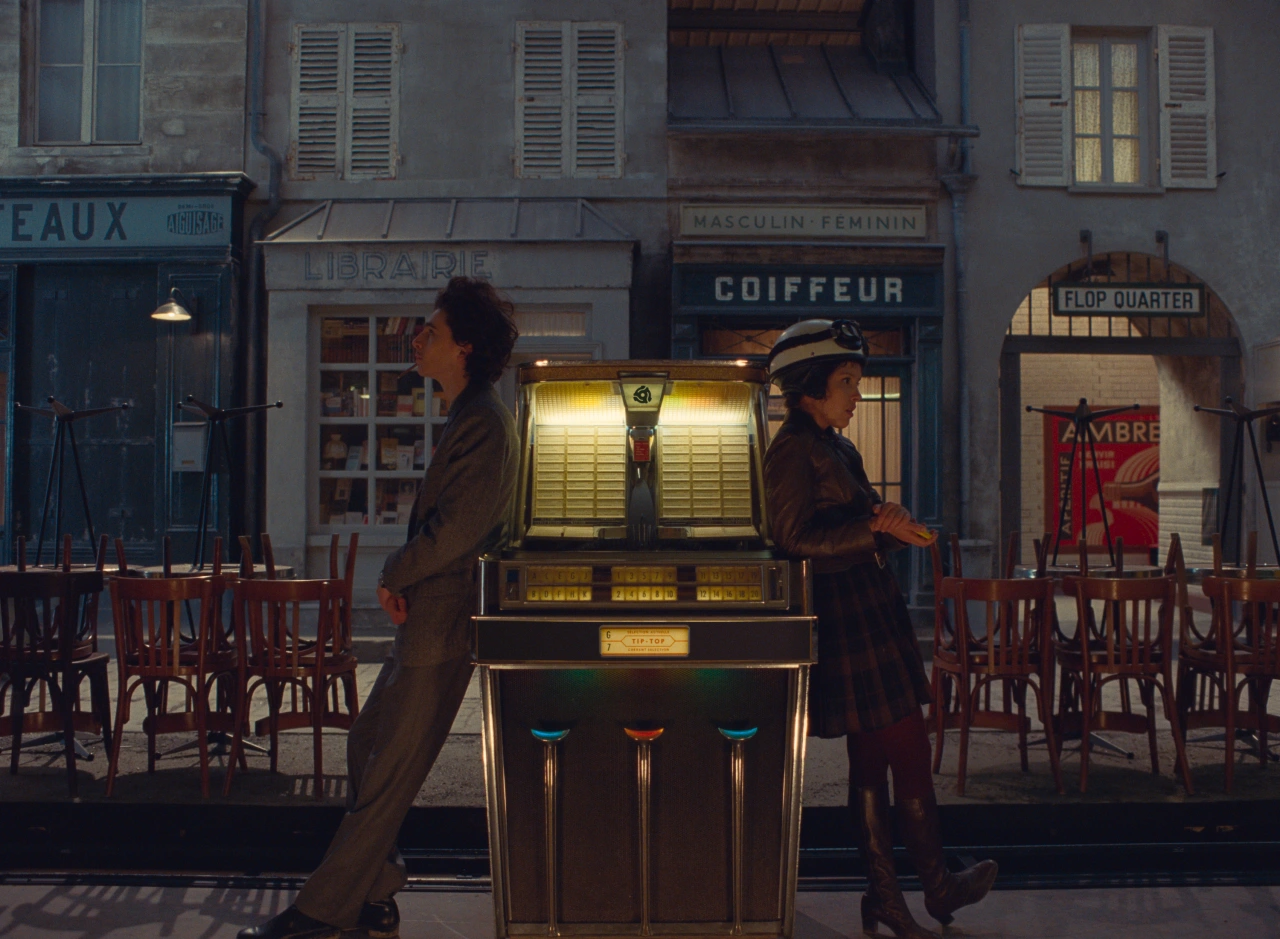 Timothée Chalamet and Lyna Khoudri in the film THE FRENCH DISPATCH. Photo Courtesy of Searchlight Pictures. © 2021 20th Century Studios All Rights Reserved