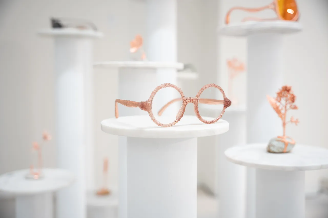 Glasses and copper flowers at Object Rotterdam