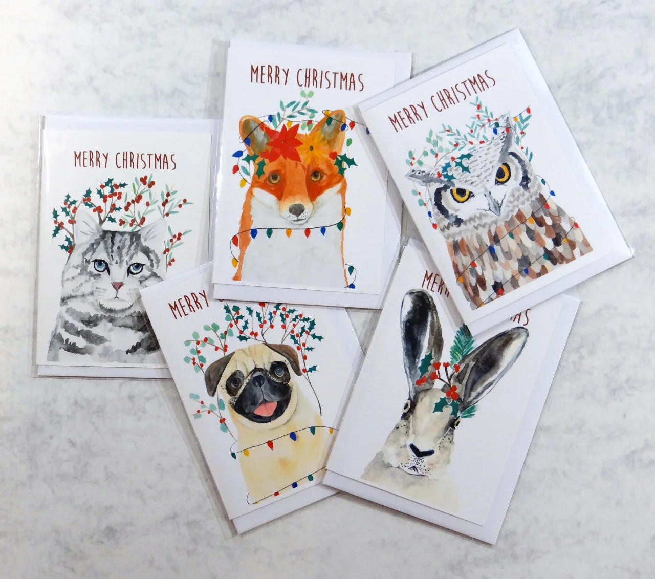 Christmas Creatures by [Pippa & Paper](https://www.etsy.com/uk/listing/741127834/christmas-card-set-woodland-animal)