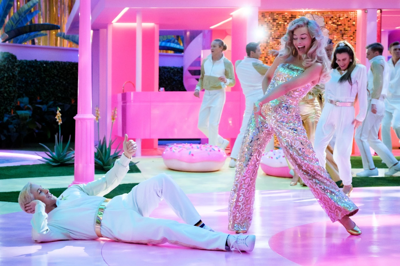 Ryan Gosling as Ken and Margot Robbie as Barbie in Warner Bros. Pictures' Barbie, a Warner Bros. Pictures release © 2023 Warner Bros. Entertainment Inc. All Rights Reserved.