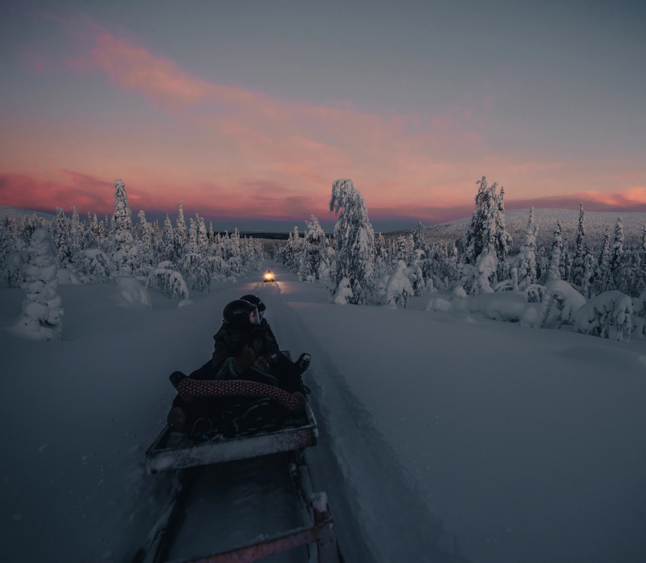 Scientists driving snow mobile to Pallas Sammaltunturi station, Finland © Konsta Punkka