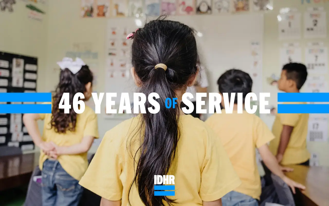 Students in yellow shirts stand in a classroom with the text "46 Years of Service" overlaid, representing the Illinois Department of Human Rights rebrand by Span