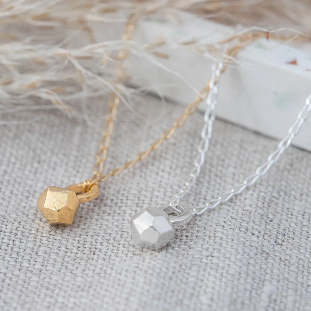 Meteorite necklace by [Elin Horgan](https://www.elinhorgan.com/product-page/meteorite-necklace-1). Priced at £80