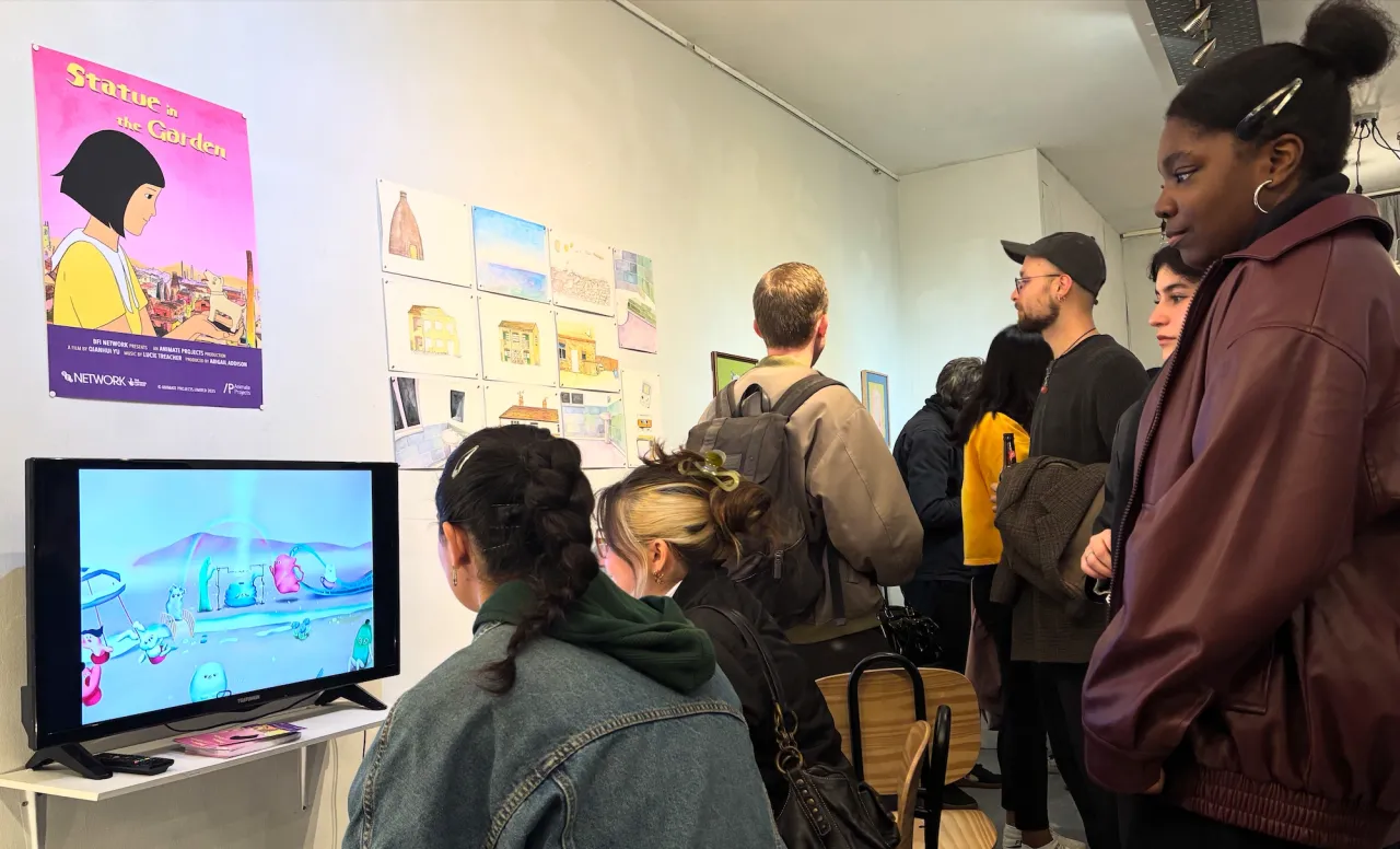 Guests enjoying the screening the private view.