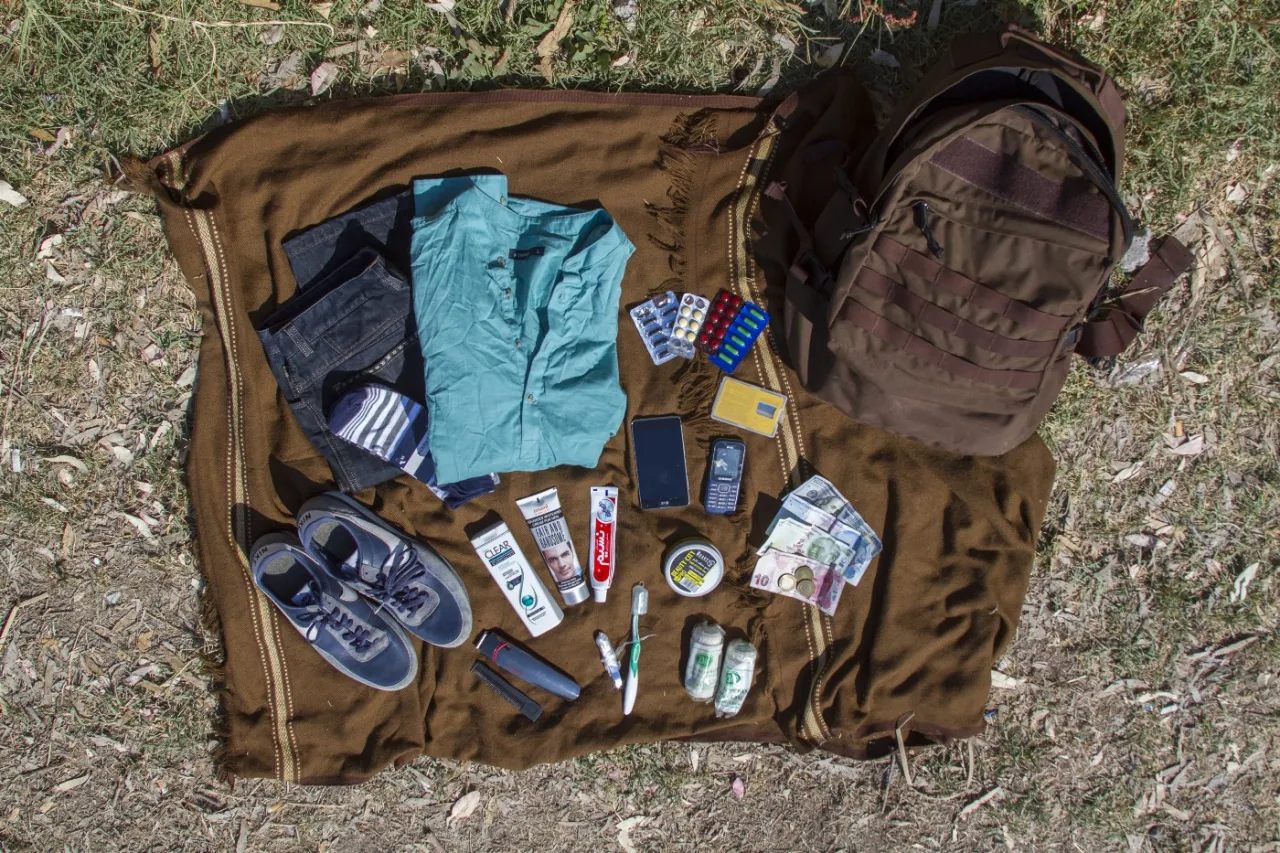 SIM cards, bandages, nail clipper, shampoo, one change of clothes