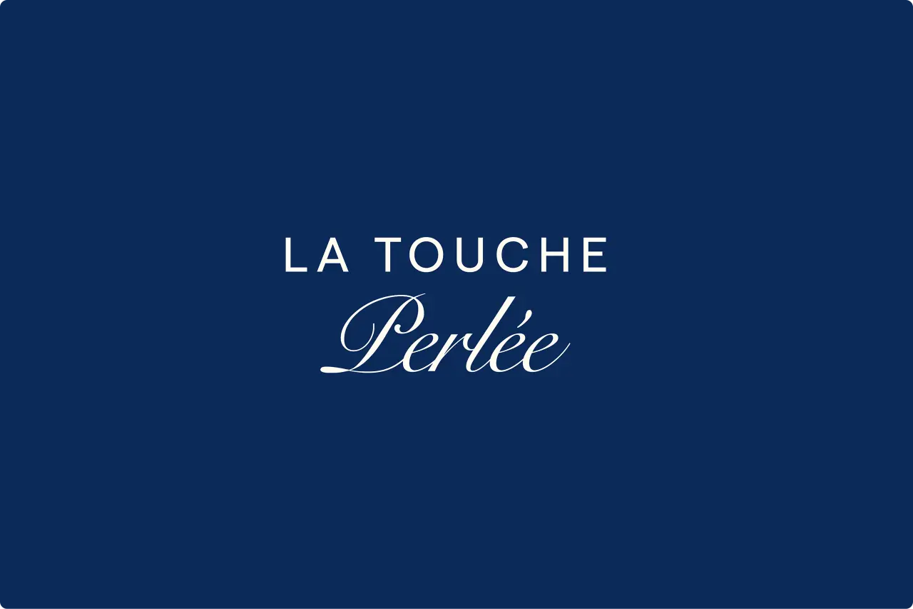 La Touche Perlée logo in white typography on a deep blue background