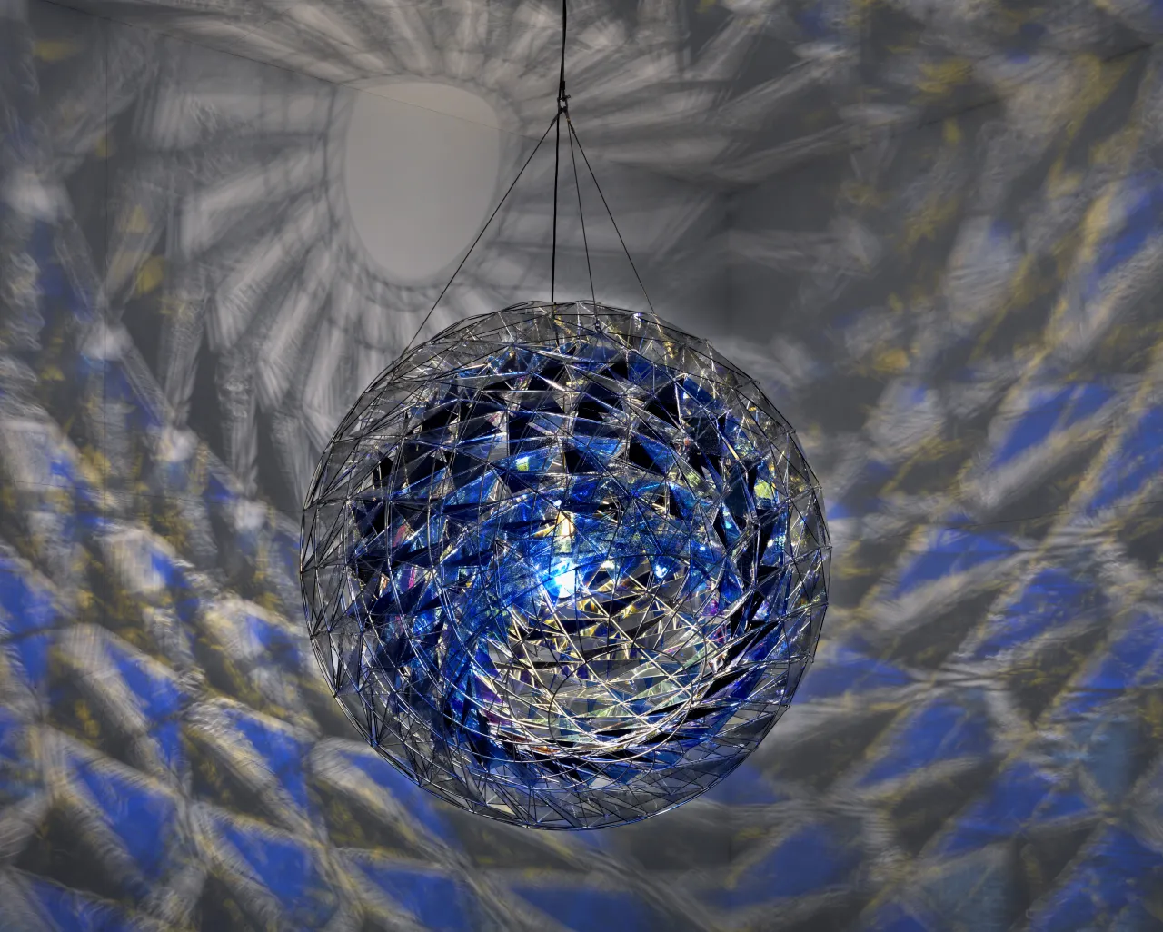 Cold wind sphere, 2012  Stainless steel, coloured glass (dark blue, blue and light grey), mirror, colour-effect filter glass (blue), bulb ø 1700 mm  Photo: Jens Ziehe  Centre Pompidou, Paris  © 2012 Olafur Eliasson