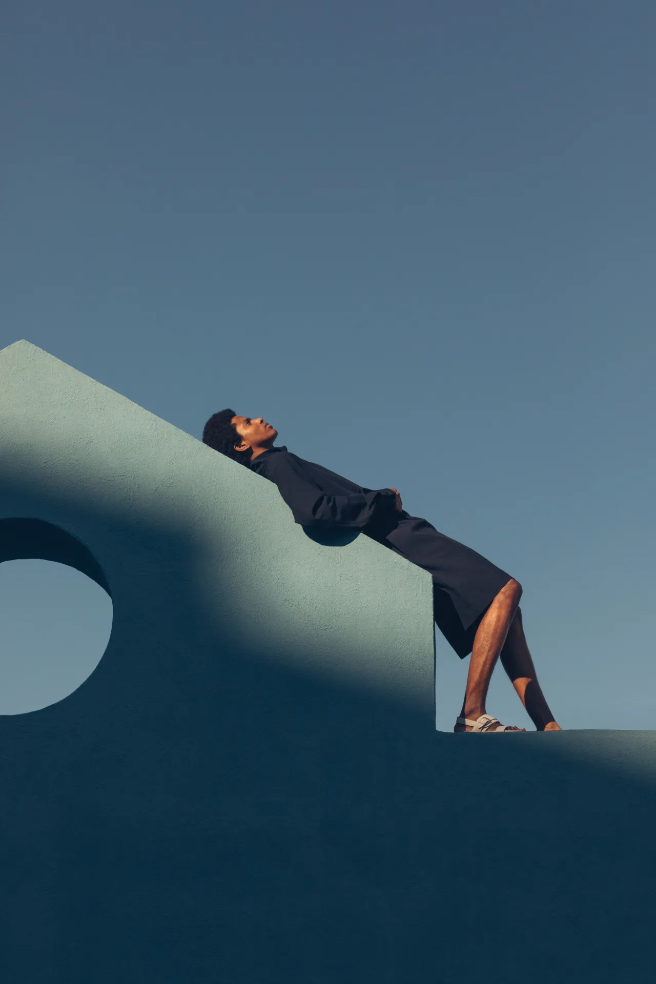 Rafael wears a shirt and shorts by Jil Sander and sandals by Hermès. Photography by Romain Laprade for Kinfolk Magazine