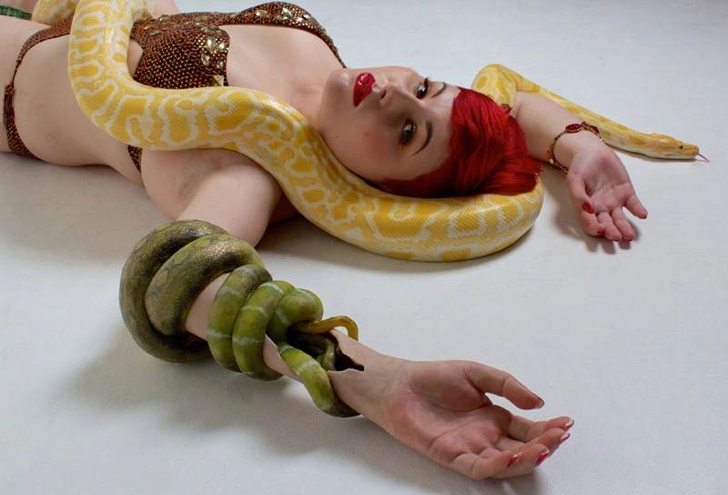 Jo-Jo Cranfield, British swimmer, inspirational speaker and swimming teacher with snakes crawling into her skin. Photo by R. Williams.