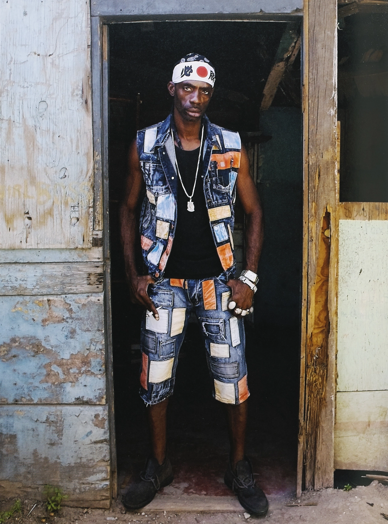 Deejay Ninjaman (Desmond Ballentine) wearing Desert Boots near his studio off Red Hills Road, Kingston, 2016. Photograph © Constanze Han