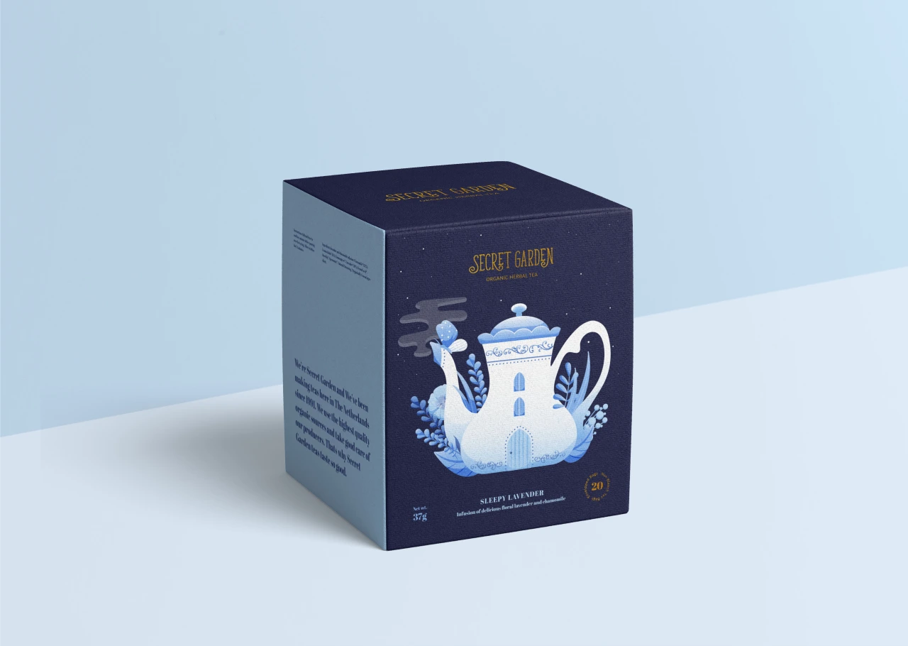 Secret Garden tea brand packaging box featuring an illustration of a white teapot designed as a lighthouse surrounded by decorative blue elements on a dark navy background