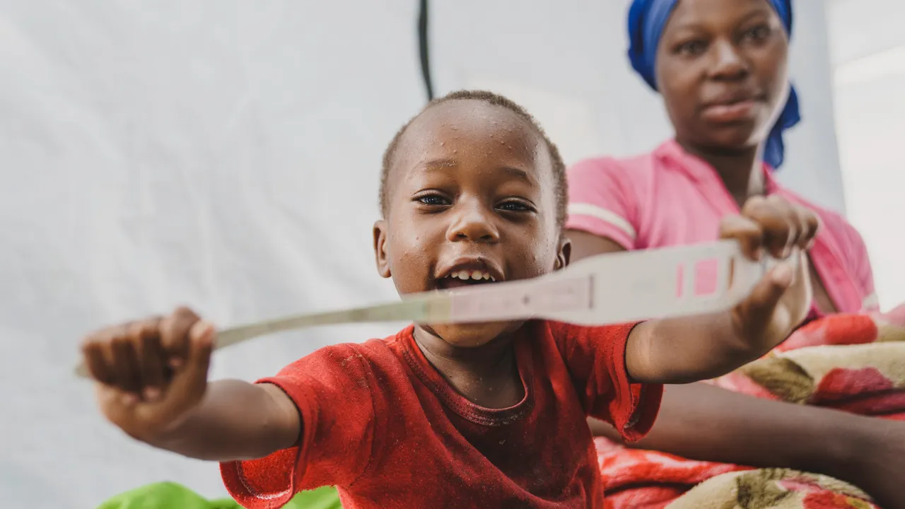 Bertin, 2, is recovering from malnutrition in DR Congo - after UNICEF’s simple armband helped detect it early.
