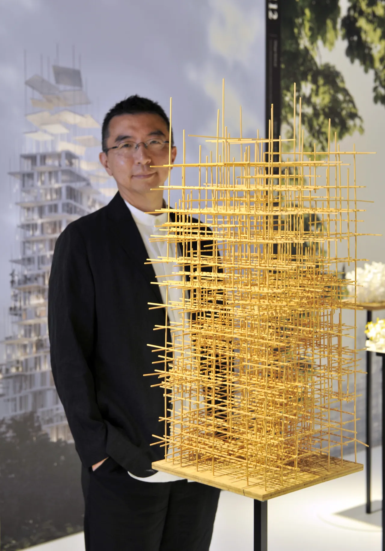 Sou Fujimoto, acclaimed Japanese architect, inspects Mist Tower, one of 100 exhibits on display in his exhibition Futures of the Future at Japan House London
