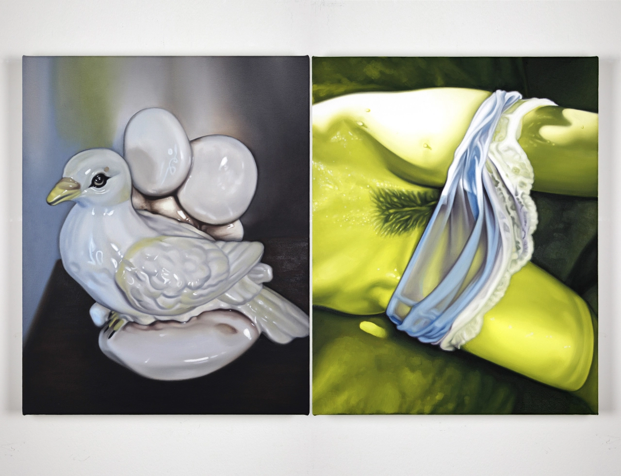 Left: white ceramic bird figurine with raised wings. Right: bright yellow-green fruit wrapped in blue and white fabric strips