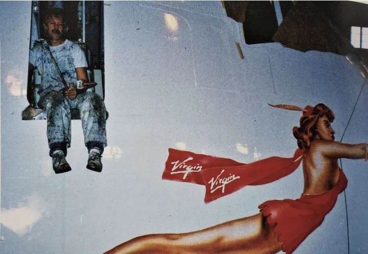 Ken posing with the Scarlet Lady