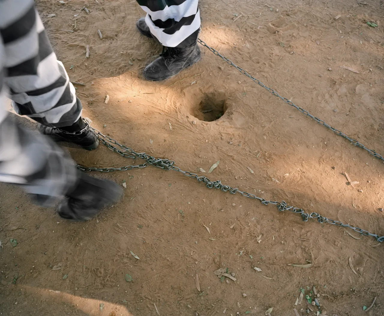 Inmates on chain gang duties