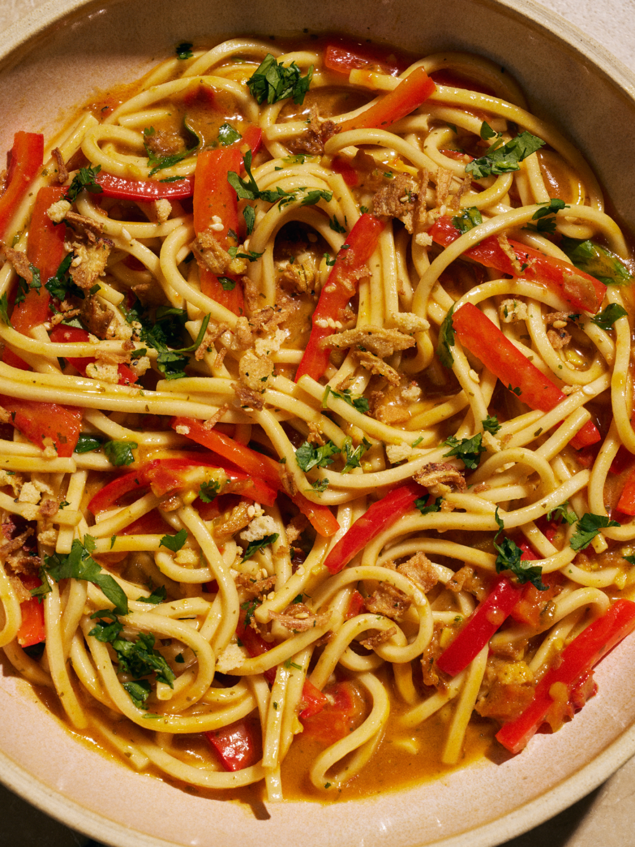 Bowl of noodles with ground meat, red peppers and fresh herbs from a Riff meal kit