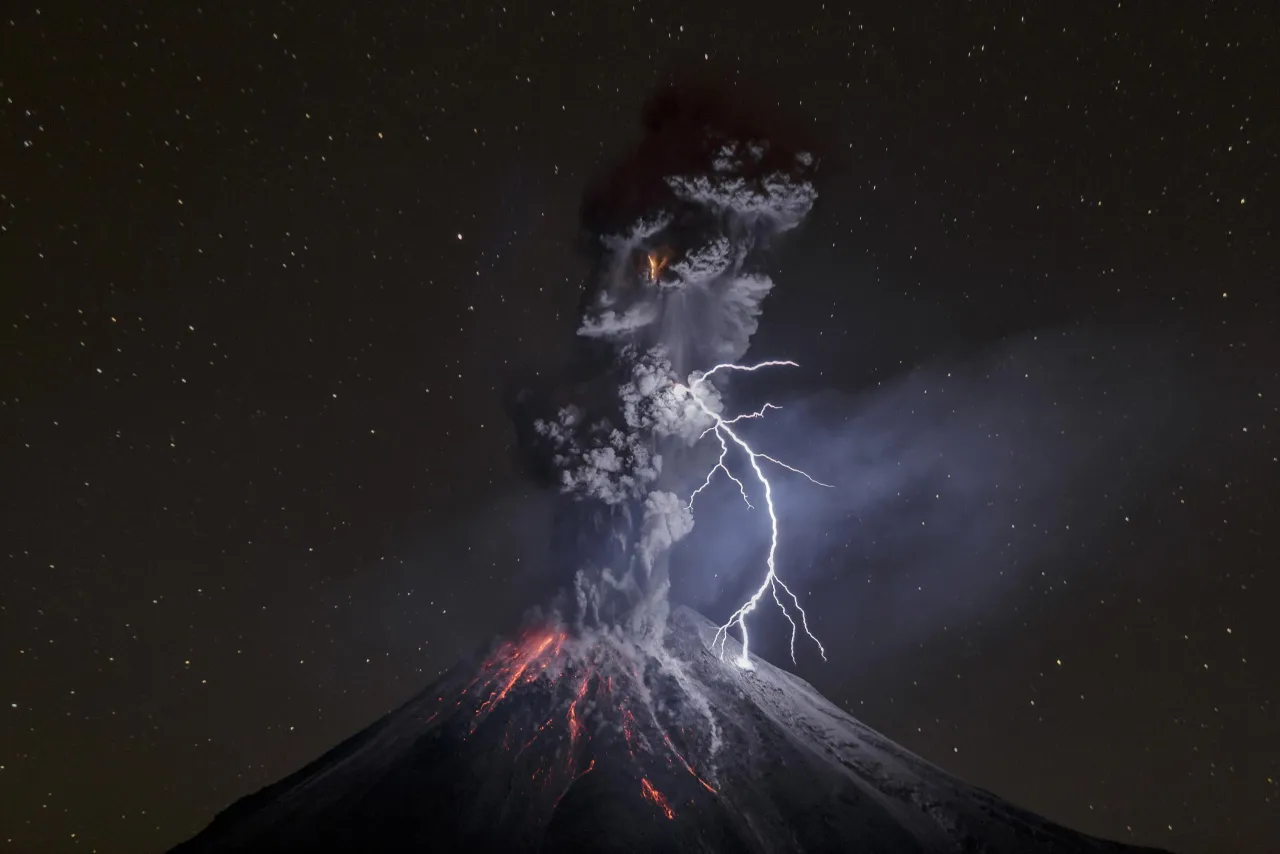 Nature, third prize singles: Colima Volcano in Mexico shows a powerful night explosion with lightning, ballistic projectiles and incandescent rockfalls; image taken in the Comala municipality in Colima, Mexico. Sergio Tapiro.