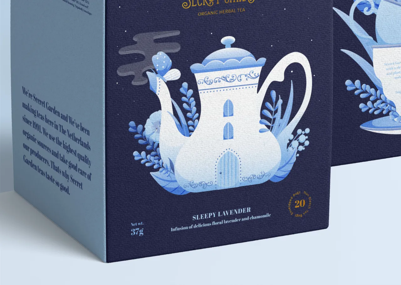 Secret Garden tea packaging box featuring an illustration of a white teapot designed as a house, surrounded by blue botanical elements on a dark background
