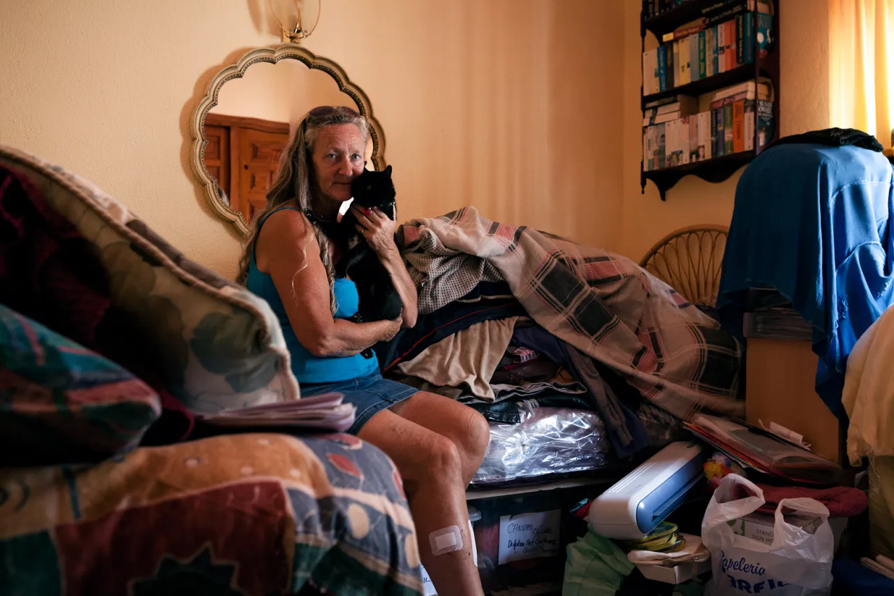 Stacey runs a charity to care for and re-home unwanted dogs. Her house is full of donated goods to sell to raise money. In her spare time she plays darts in a local league and looks after her four cats.