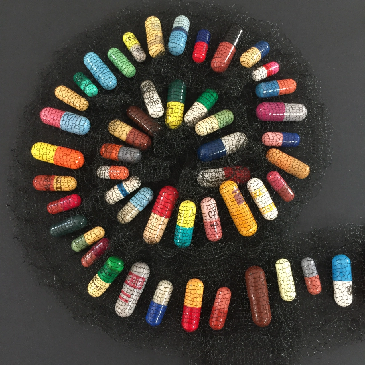 Recognition Framed Capsules Spiral © Susie Freeman