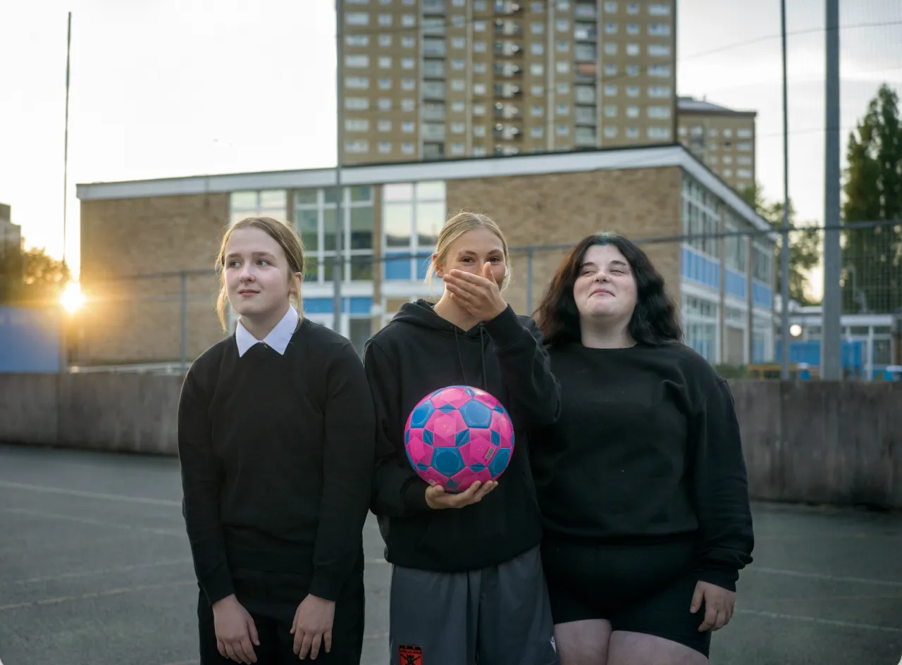 Trinity, 14, Layla, 16, and Maisie, 15, at the Buckland youth activity centre, Portsmouth. Against the Tide, 2026. Photograph by Polly Braden