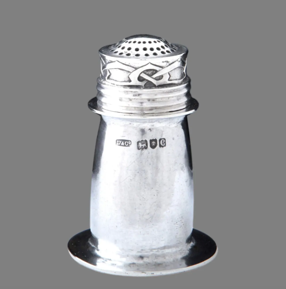 Silver “Cymric” pepper castor, 1898