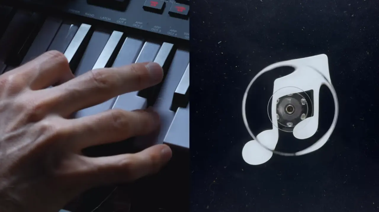 Hand playing black and white keyboard keys on the left, alongside Apple Music's new logo featuring a musical note shape formed from ripples, on the right