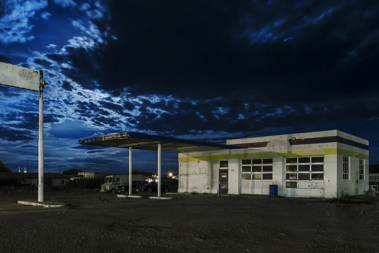 After violent storms the moon starts to creep out from behind thick clouds; a transition from violent skies to calmer ones. Throughout both, the world around seemed strangely quiet.