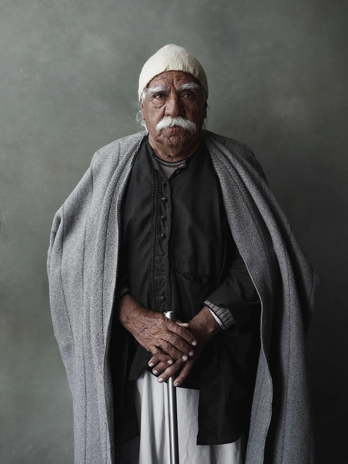 Portrait of survivors of a Êzidî genocide: Sehdo Xelef. Newroz Refugee Camp, Derîk, Jazira Canton, Rojava, Syria, March 13, 2015. From [We Came From Fire​](​https://amzn.to/2L9l8Vm) by Joey L. – published by powerHouse Books