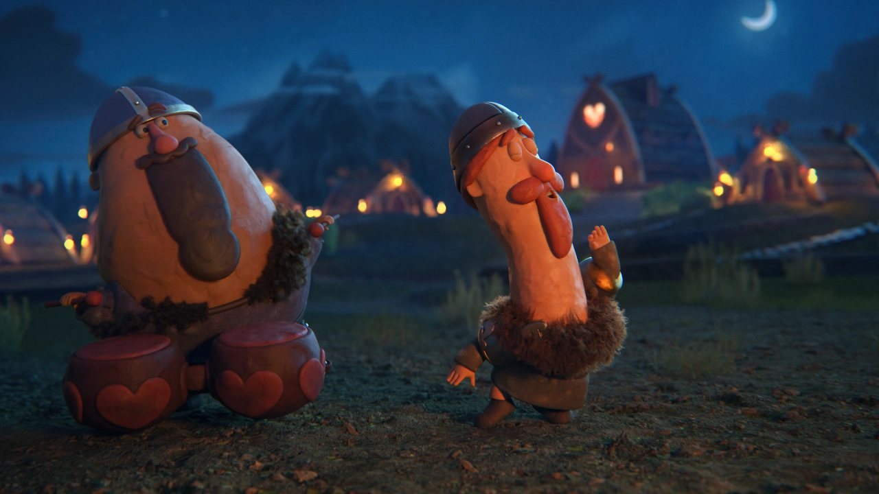 Jordic the Viking and a companion stand in a moonlit village landscape with glowing buildings in the background, delivering their health warning message