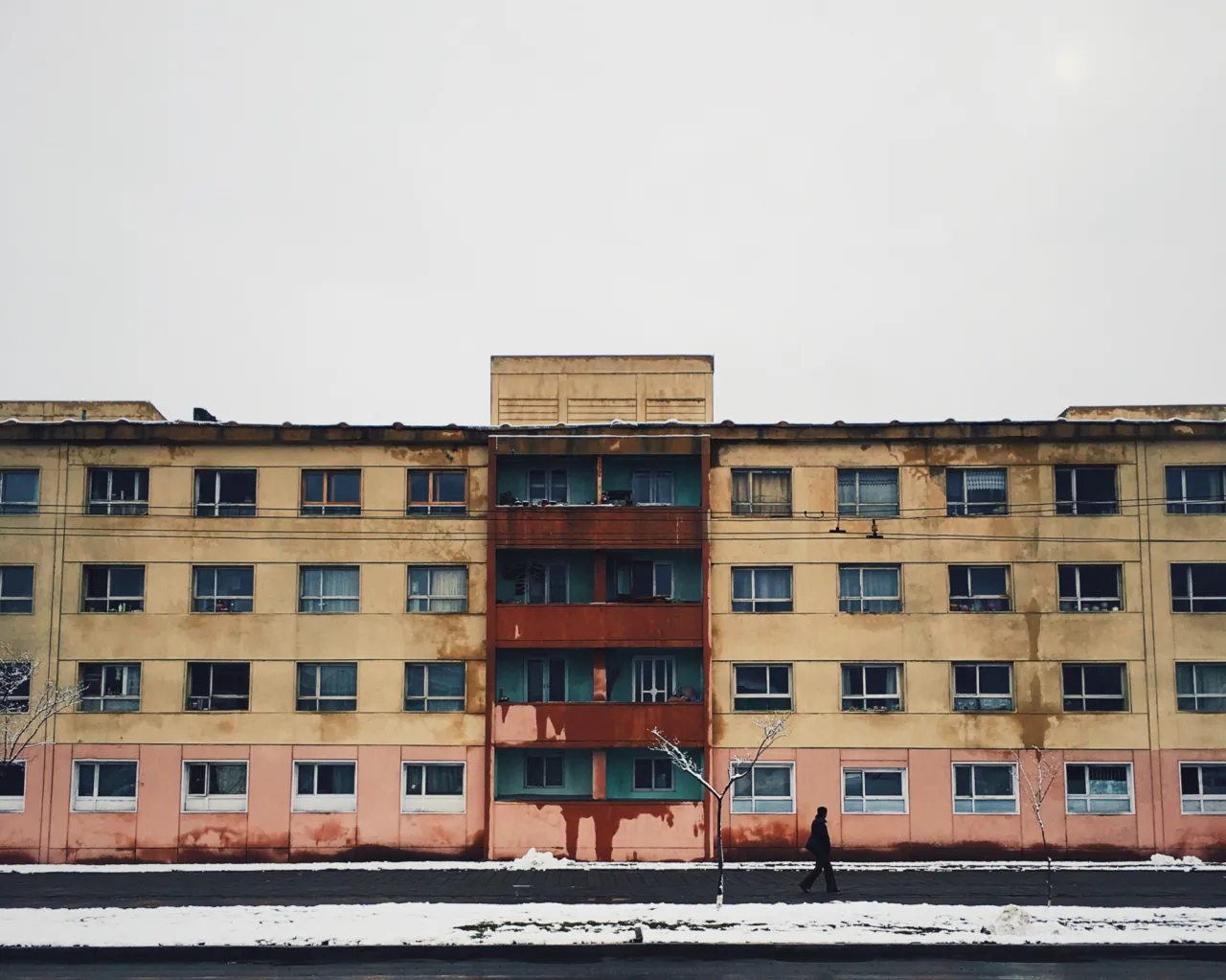 A row of block apartments which was built/provided by the East Germans