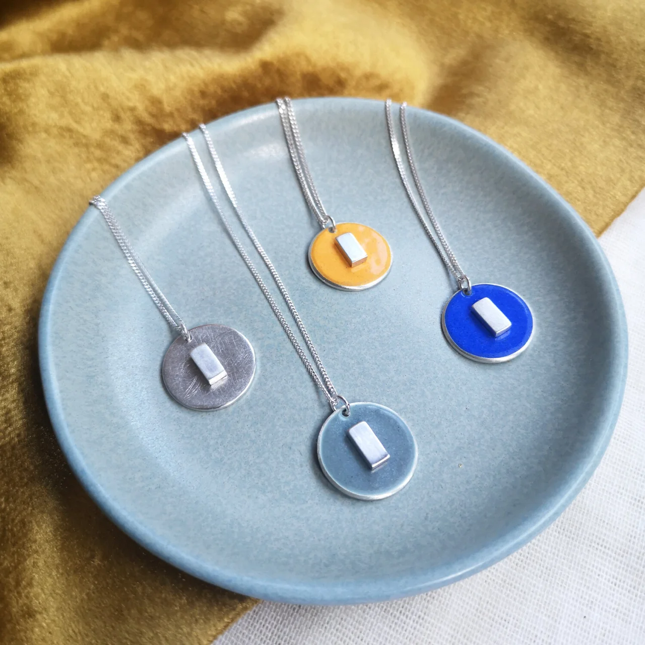Disc and Block pendant by [Smith & Gibb](https://www.smithandgibb.com/shop/p/disc-amp-block-pendant)